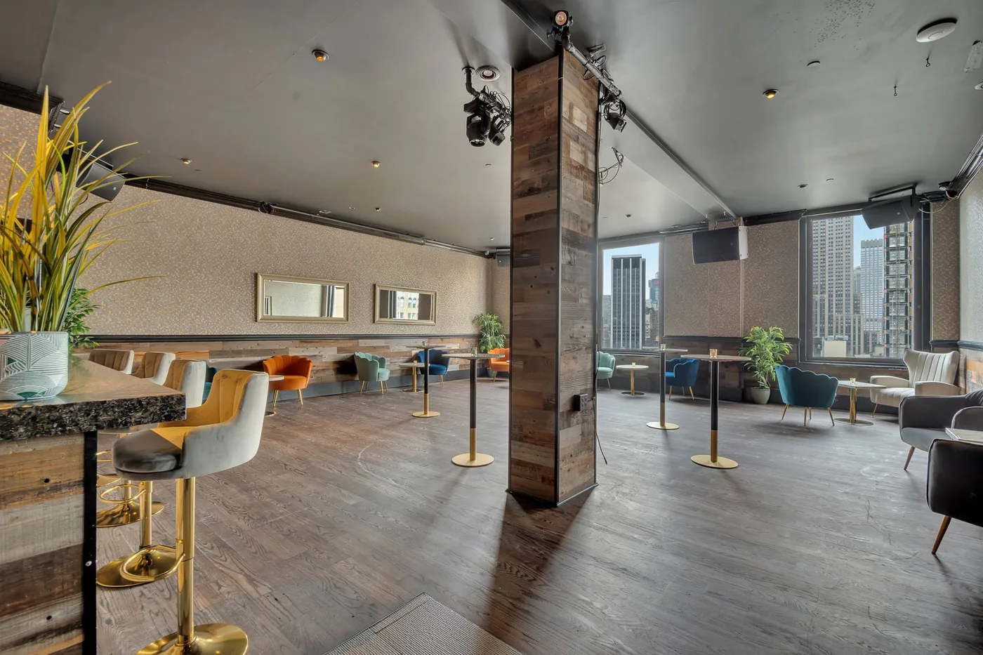 230 Fifth Rooftop - enclosed lounge windows skyline