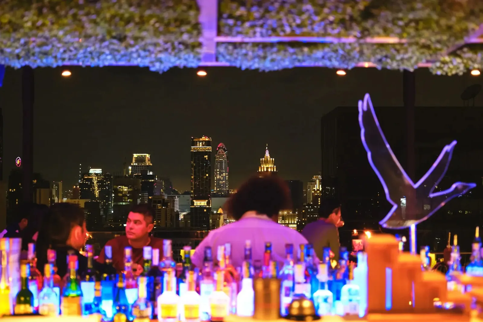 Above Eleven - night bar bird sculpture