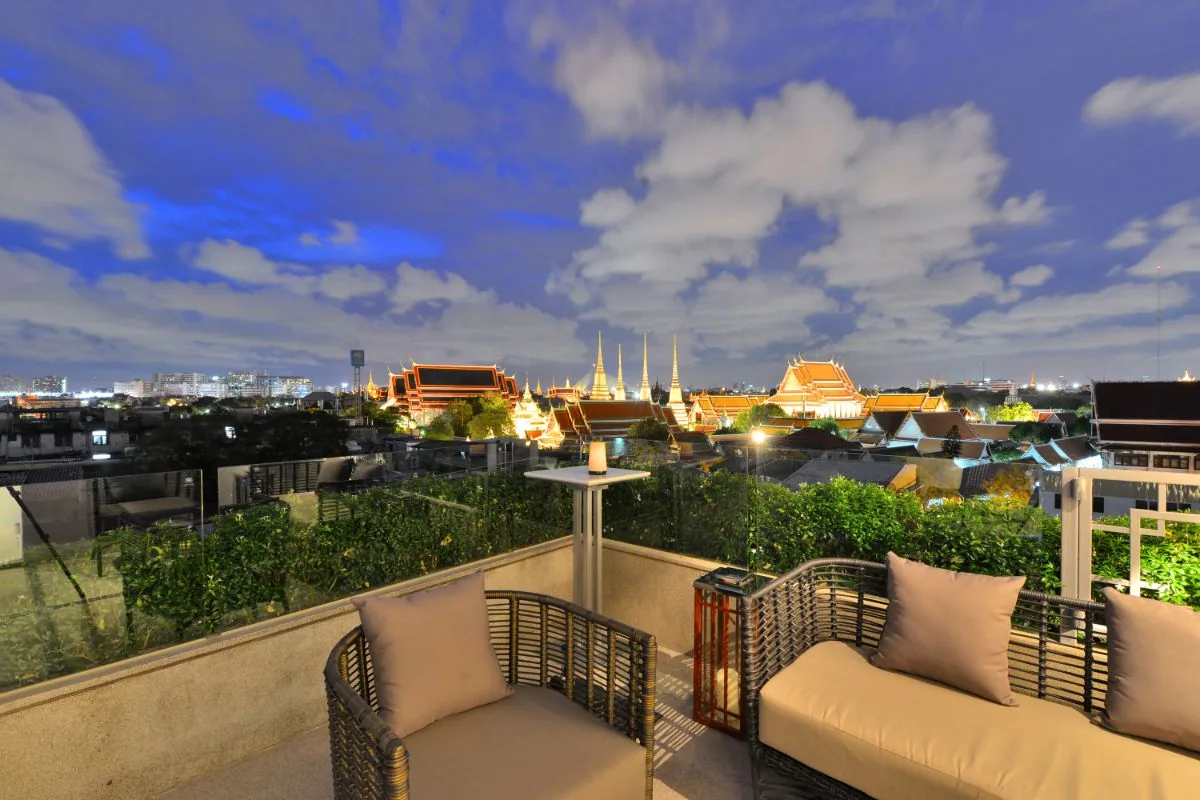 Above Riva - rooftop lounge sofa temple view
