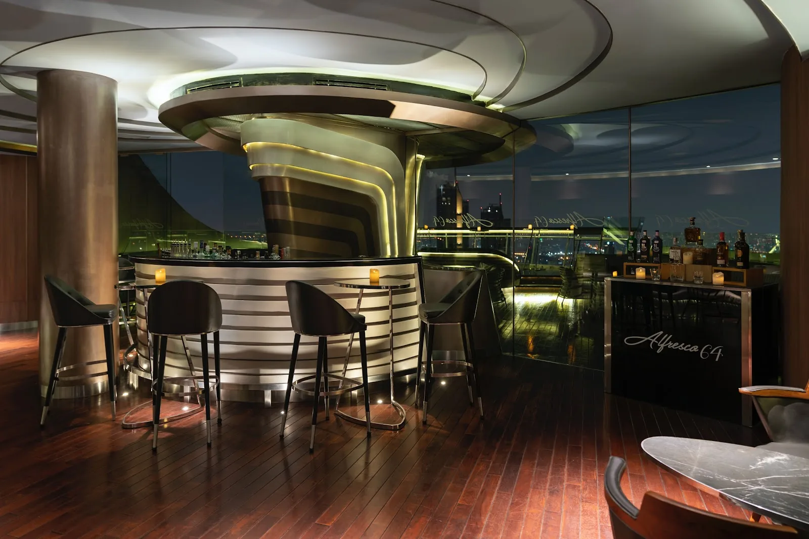 Alfresco 64 - fix signature sculptural metallic round bar city view