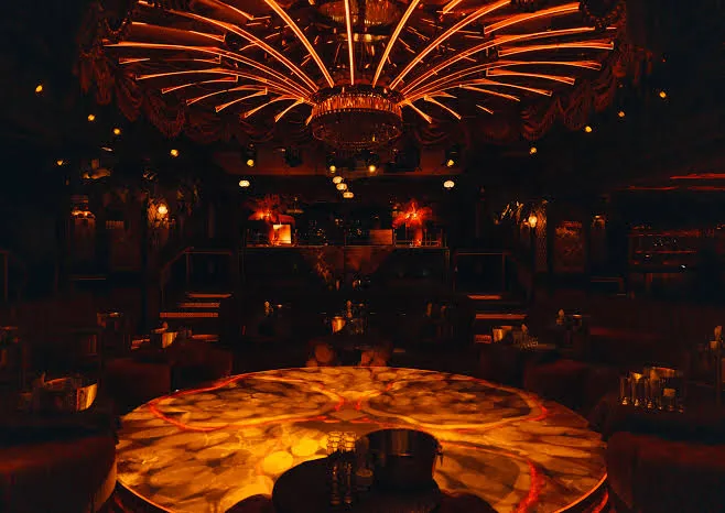 Alma - onyx bar in amber light