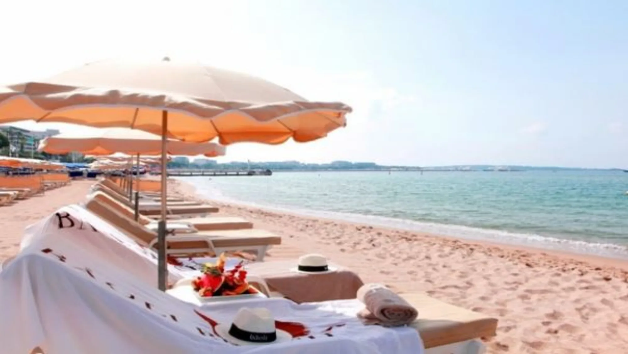 Annex Beach - sunset loungers over the sea