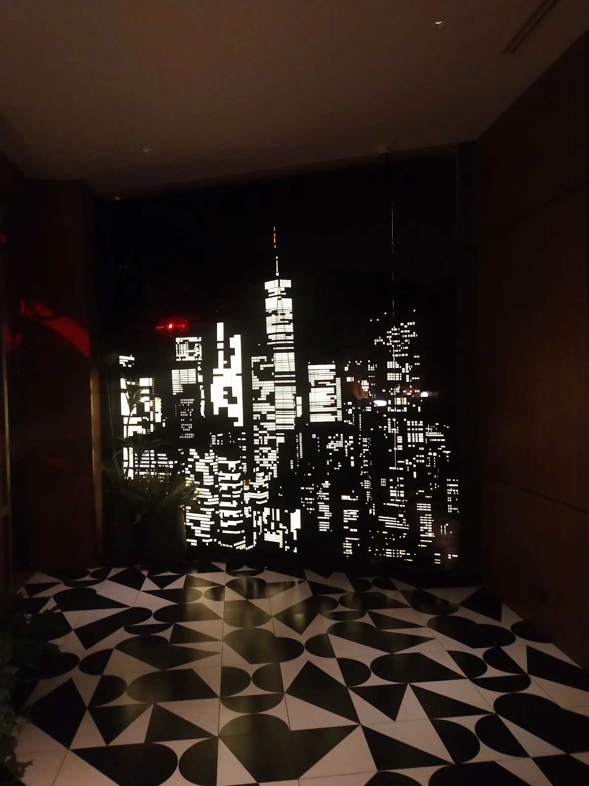 APT 101 - add nyc skyline light screen black white geometric floor corner