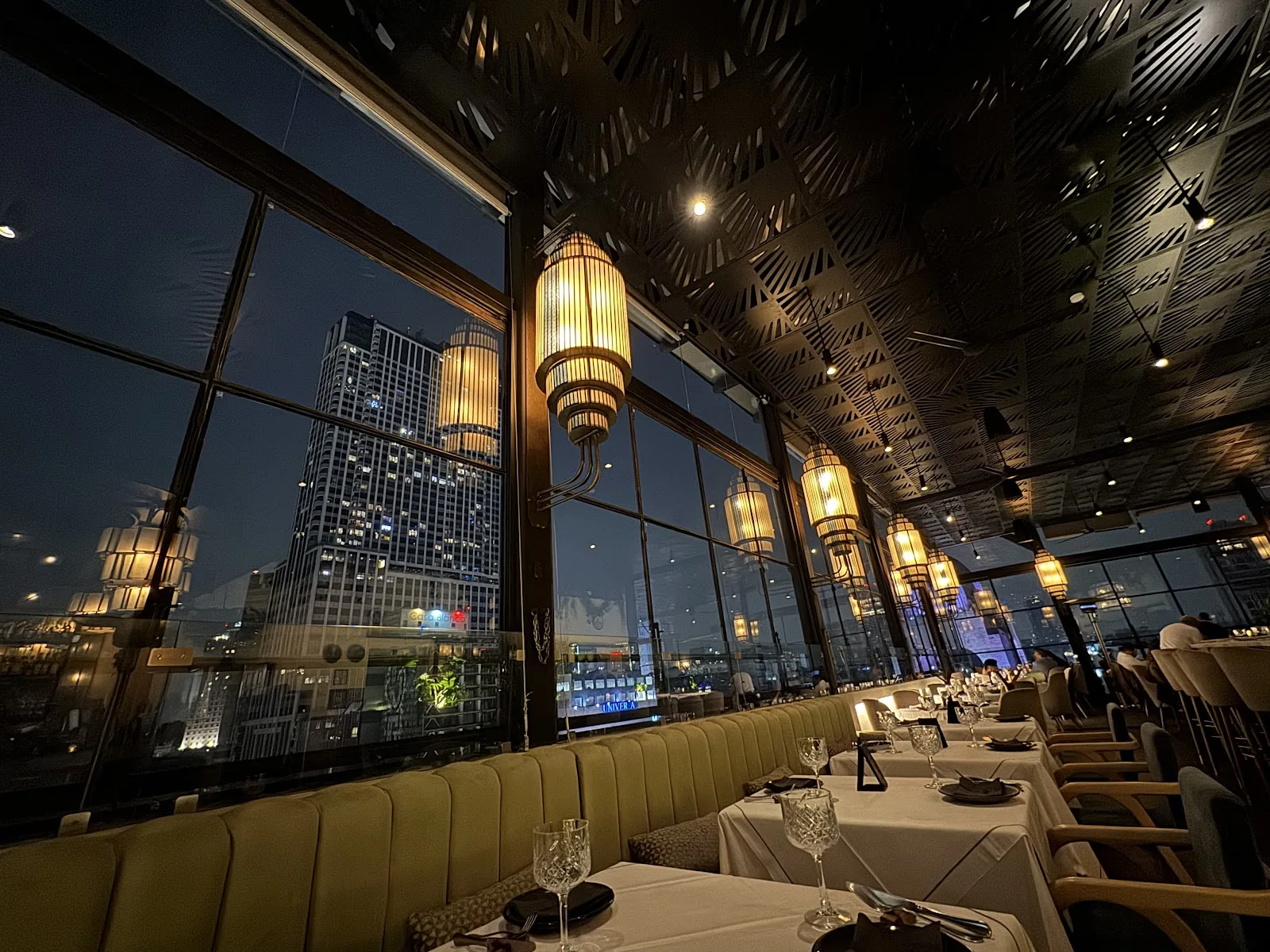 Arango - interior dining room dusk skyline