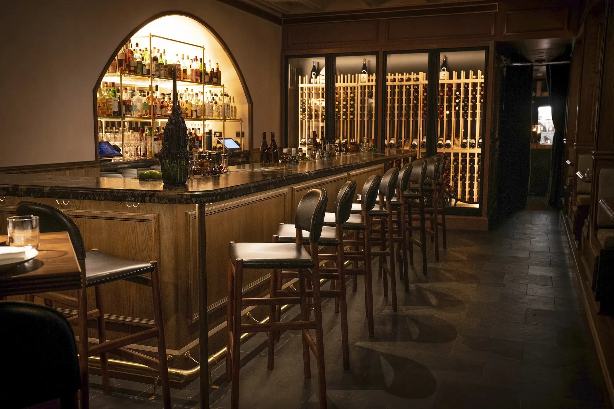 Asador Bastian - bar wine wall