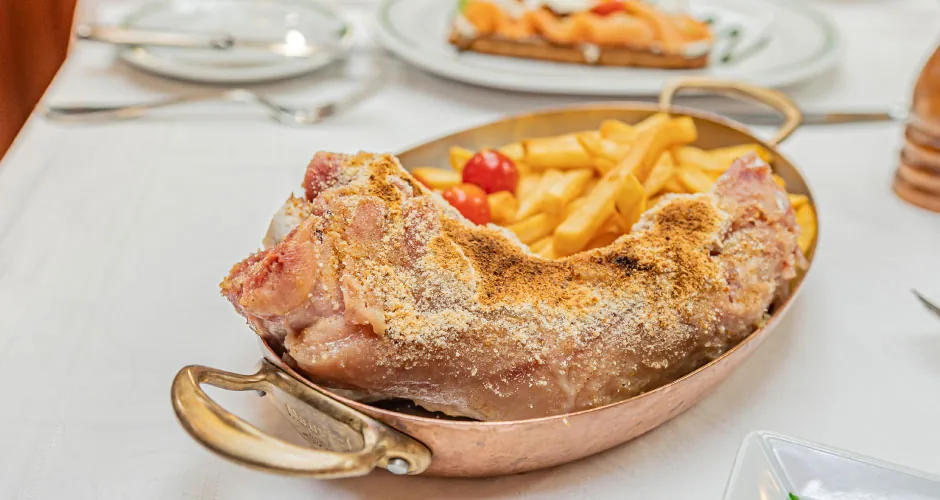 Au Pied de Cochon - signature pied de cochon with fries