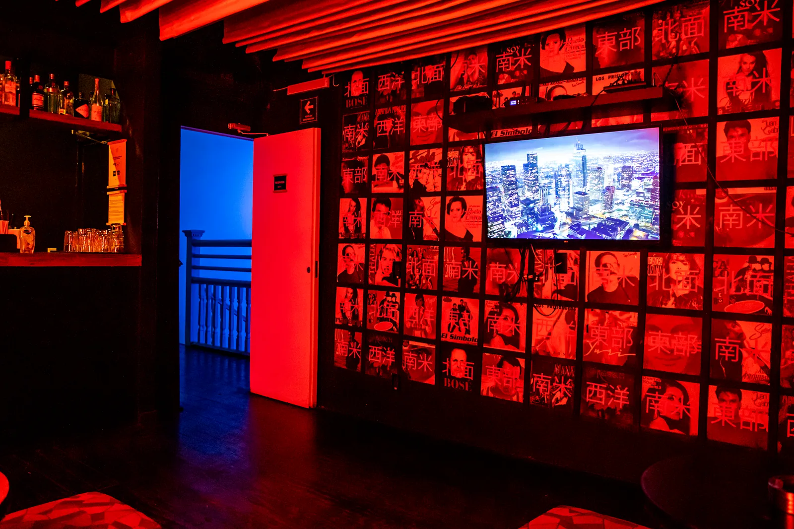 Bar Oriente - glass block wall under red lighting