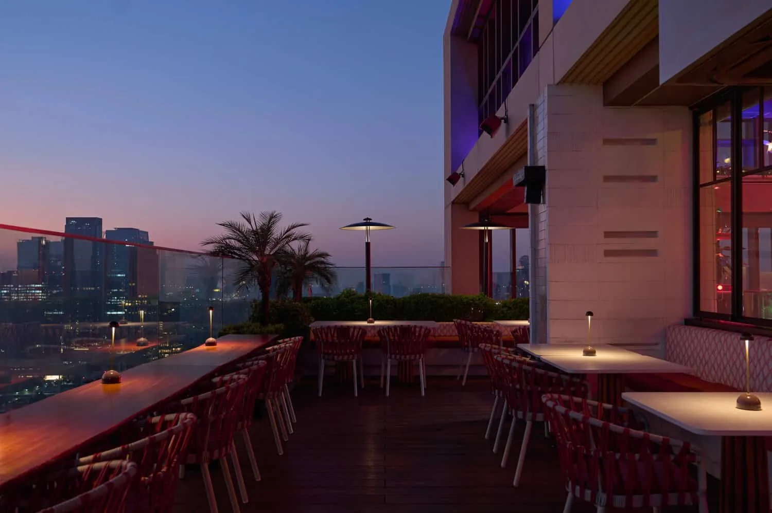 Bar.Yard - rooftop lounge seating dusk skyline