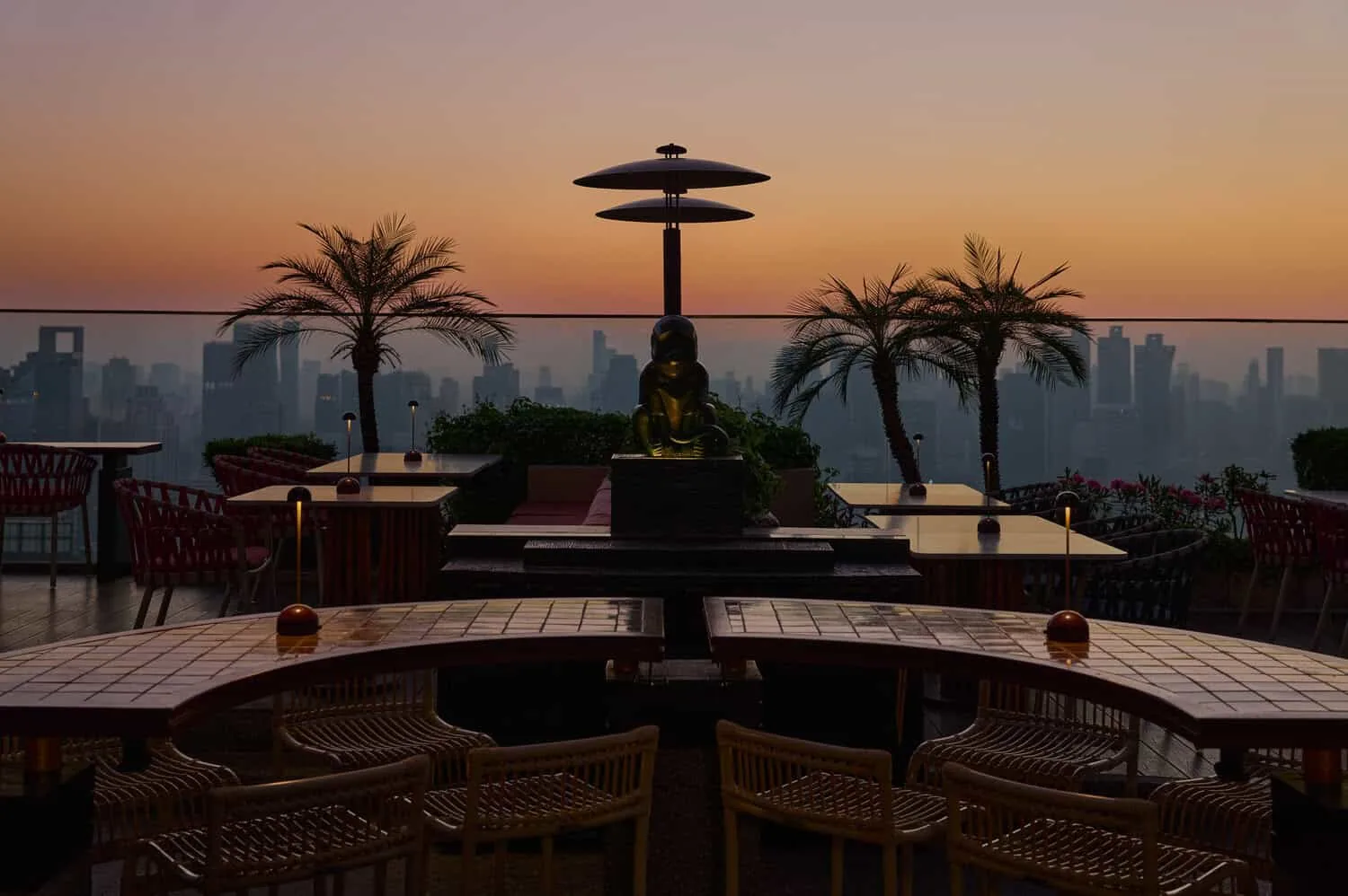 Bar.Yard - rooftop garden palms sculpture skyline