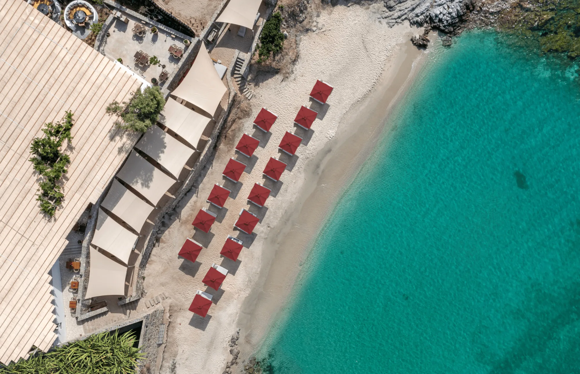 Beefbar - aerial beach red umbrellas