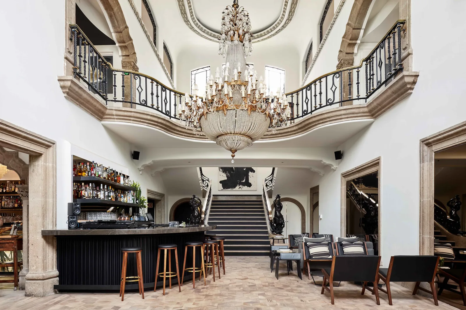 Blanco Castelar - grand hall with chandelier bar and stai