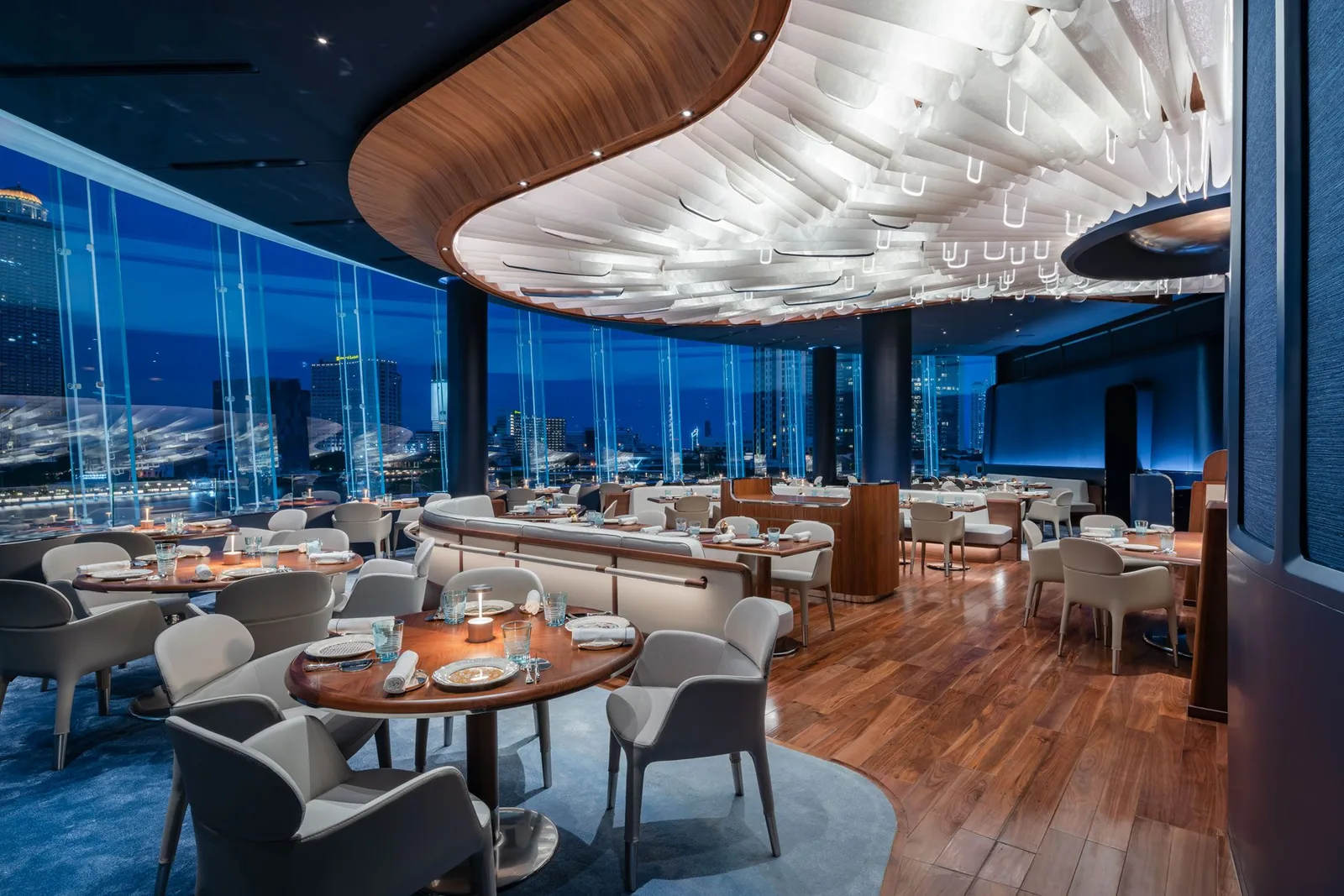 Blue by Alain Ducasse - dining room round tables