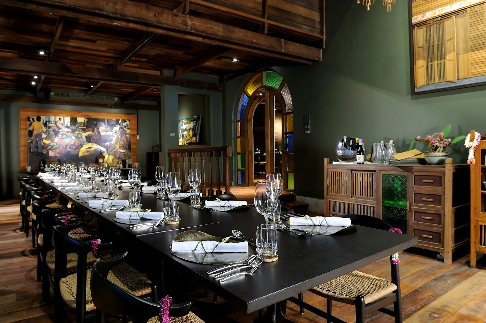 Bo.lan - add private dining communal table green walls wine display