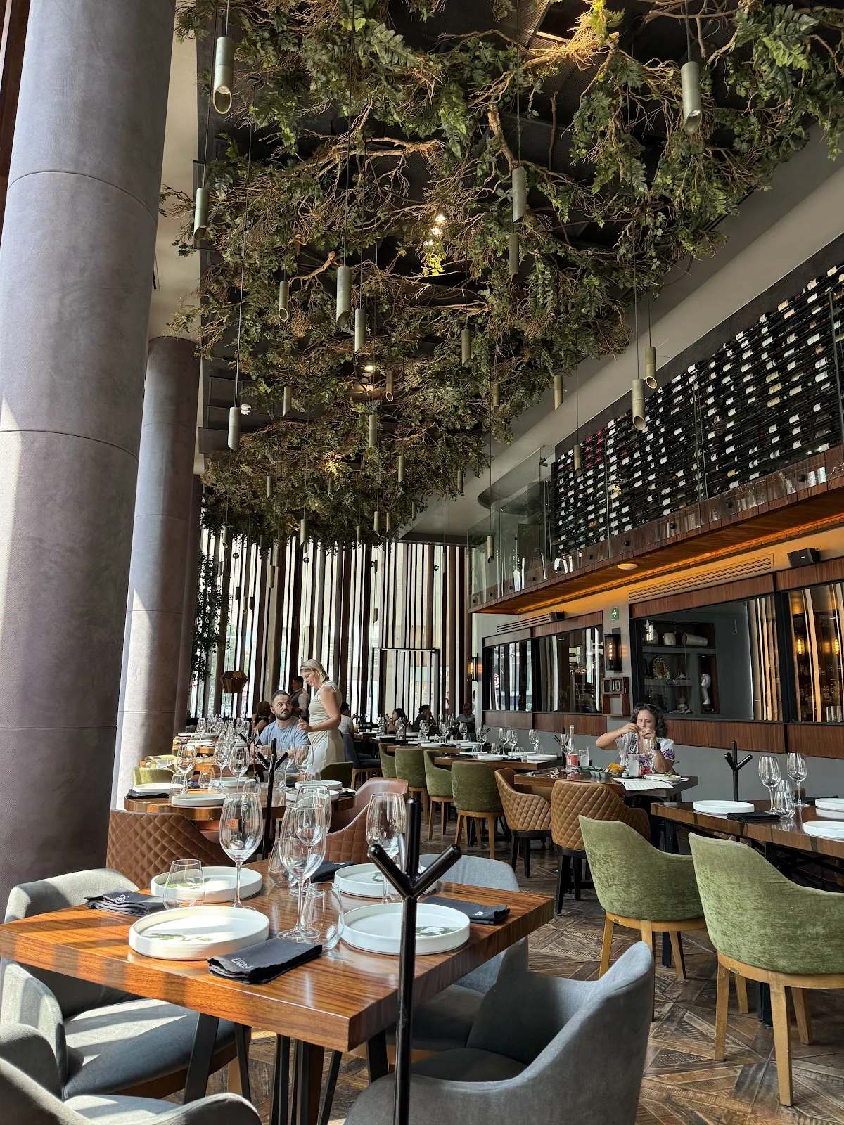 Carmela y Sal - bar with hanging greenery