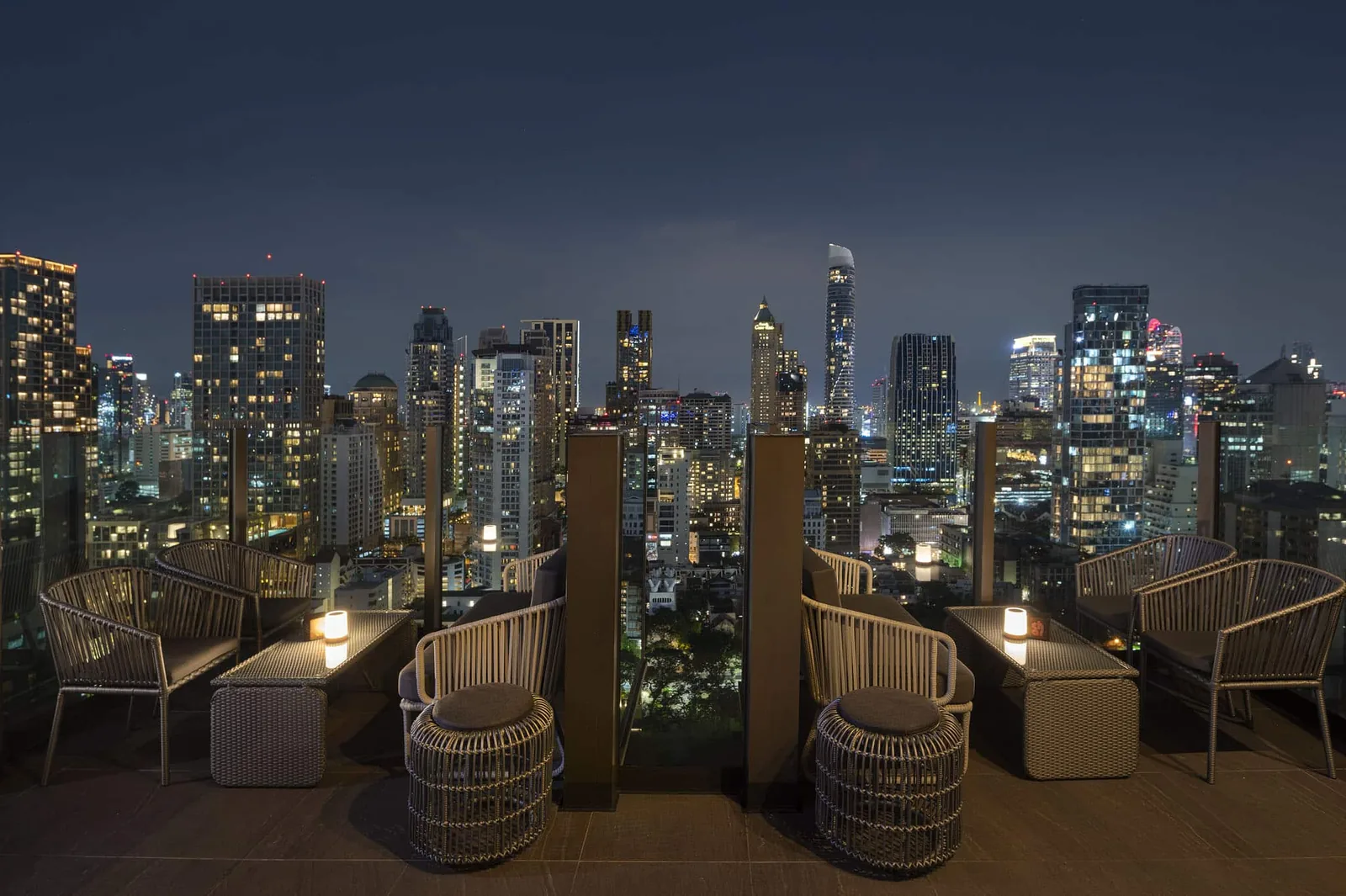 Char Rooftop Bar - rooftop lounge mural night skyline