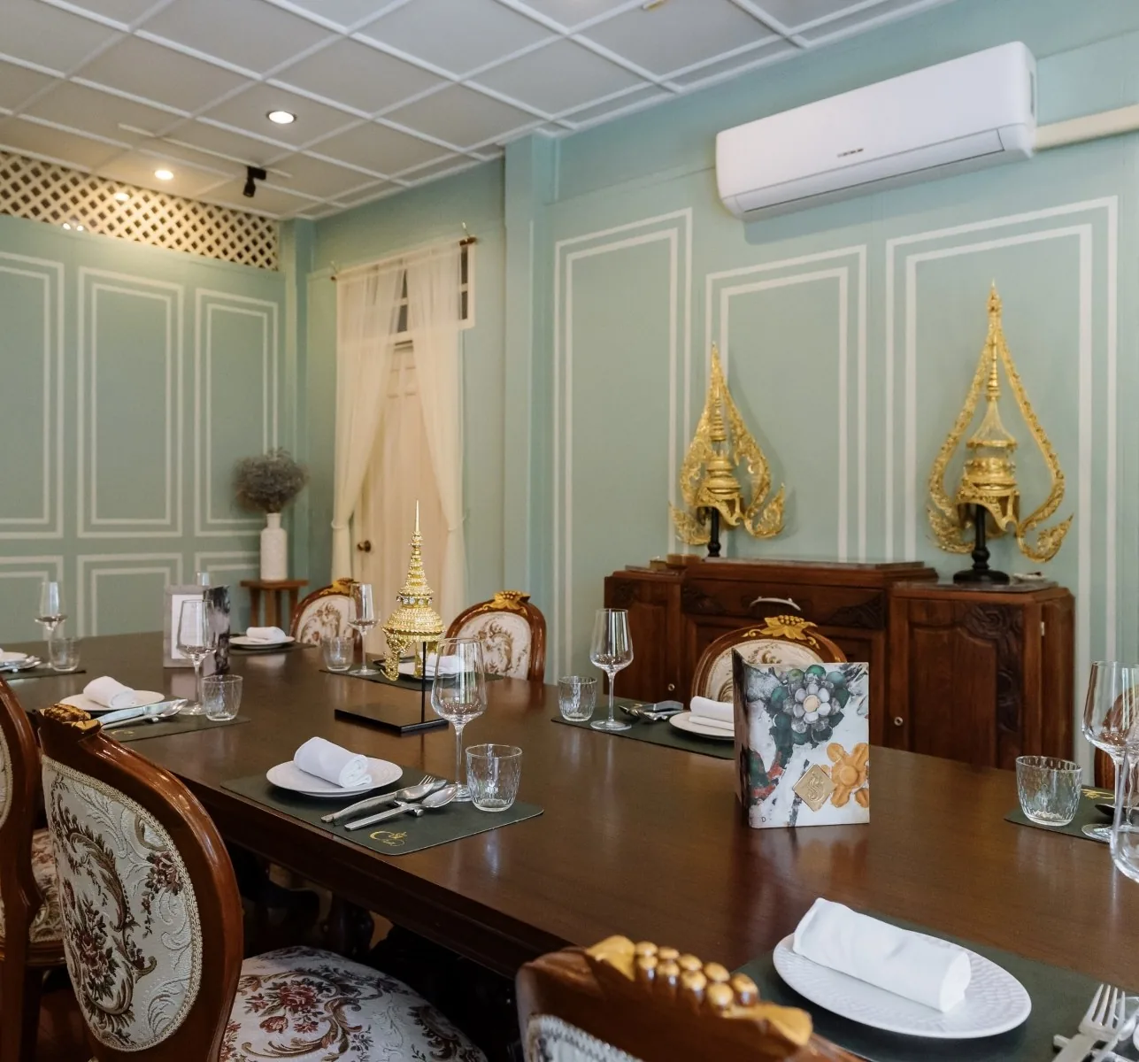 Chim by Siam Wisdom - add pale green panelled private dining room gold thai regalia sideboard