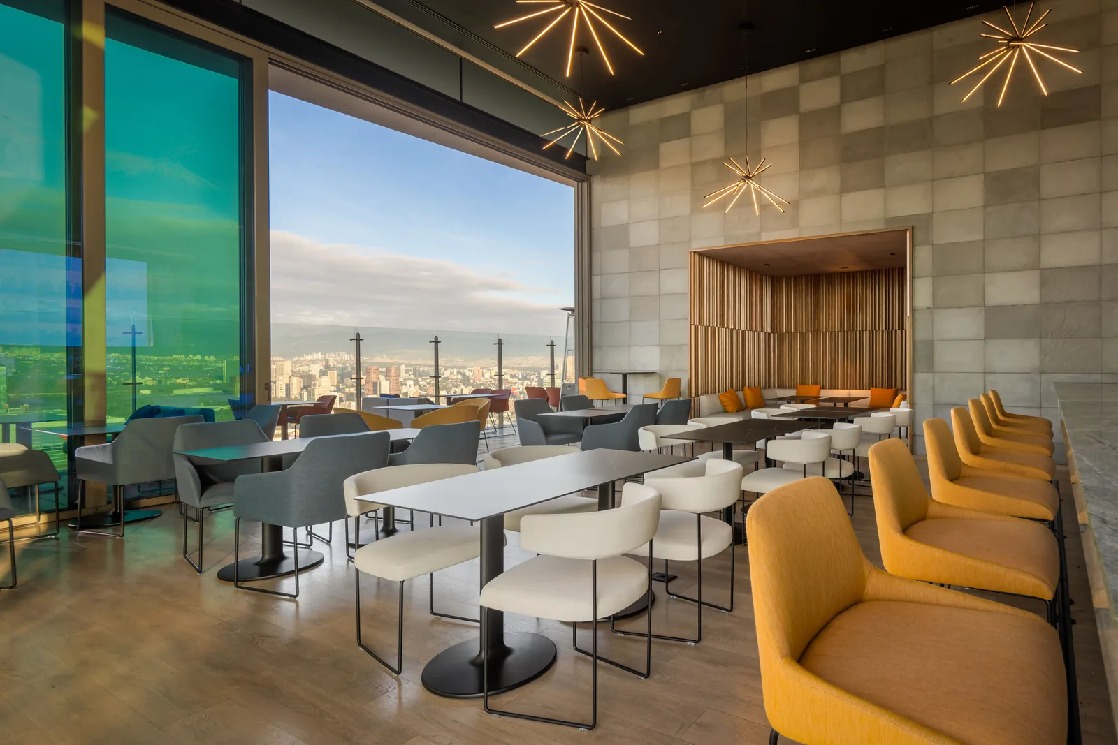 Cityzen Rooftop Kitchen - banquette row along windows
