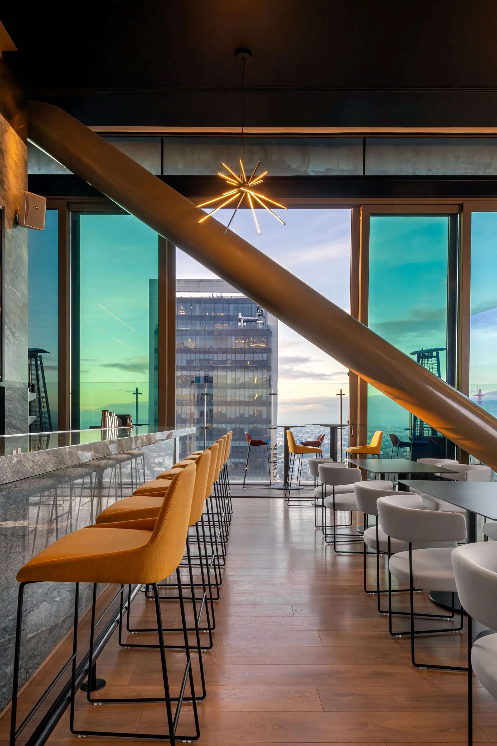 Cityzen Rooftop Kitchen - bar stools and open kitchen