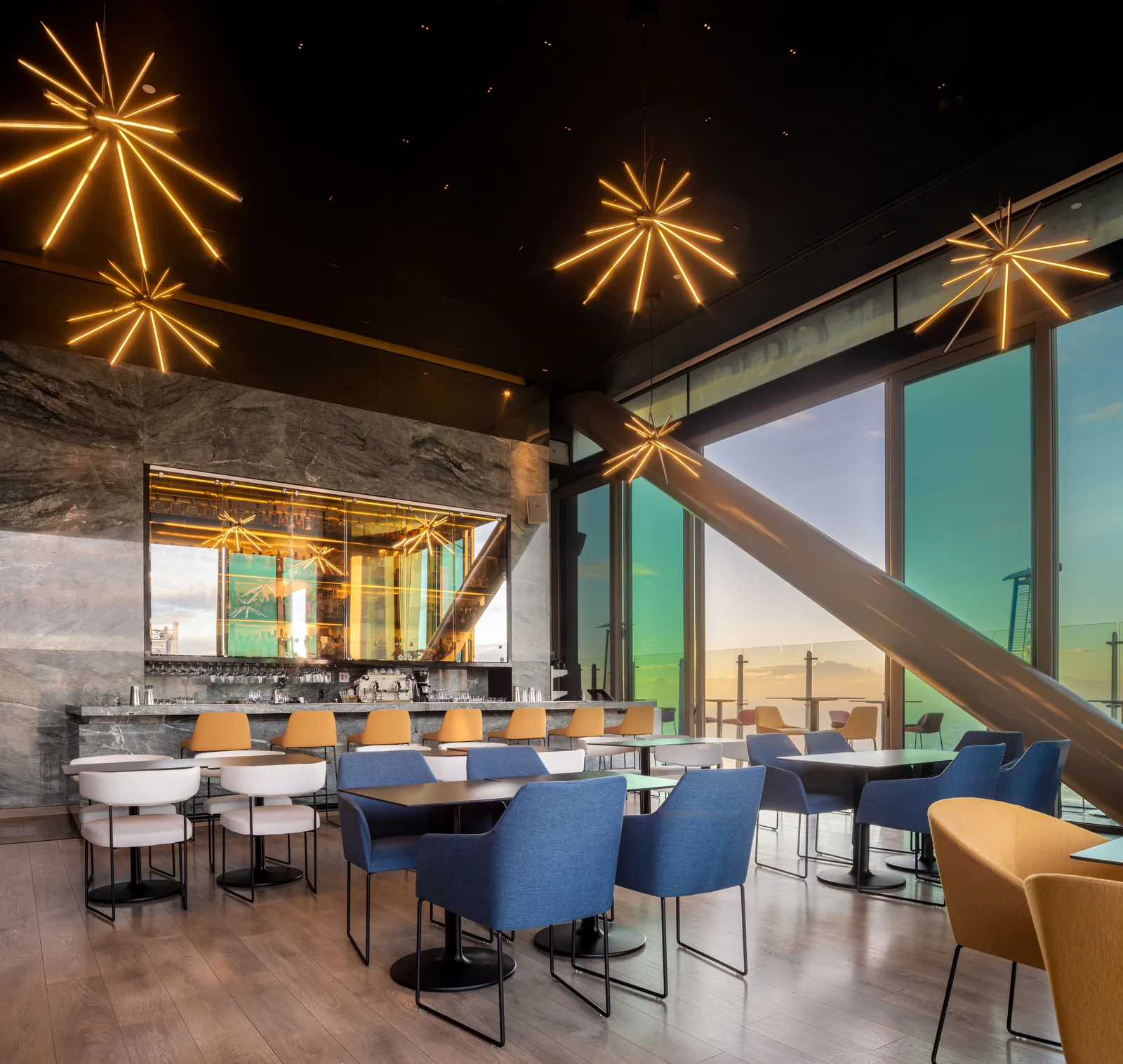 Cityzen Rooftop Kitchen - dining room starburst lights