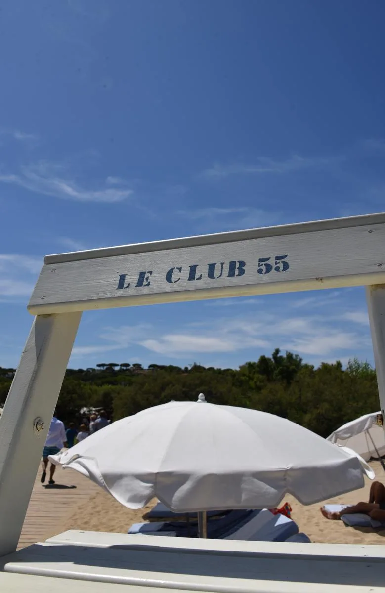 Club 55 - le club 55 beach sign