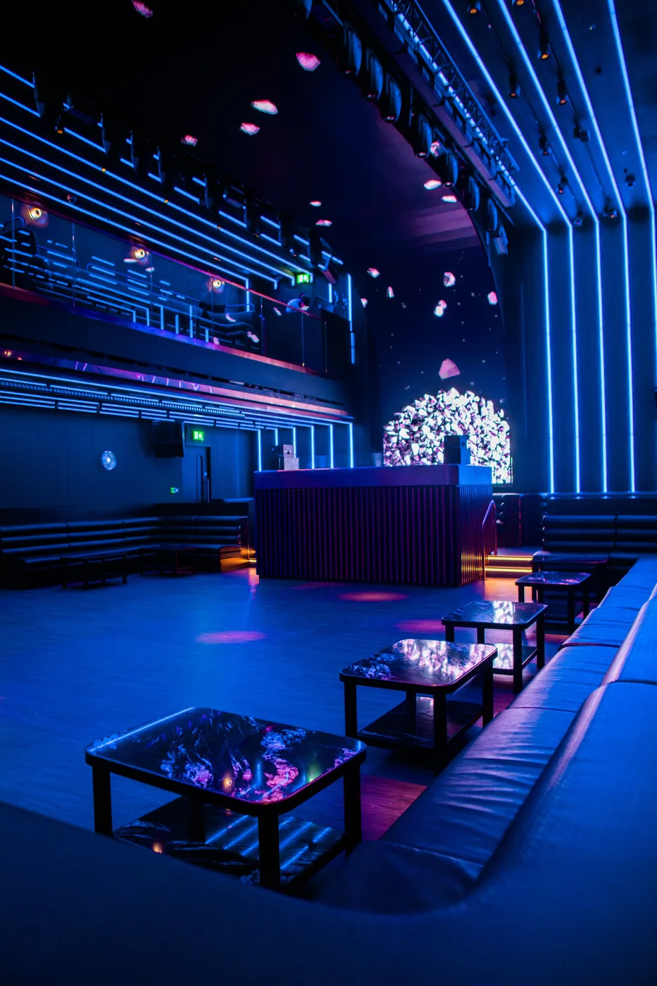 Club 77 - dj booth and tables blue light
