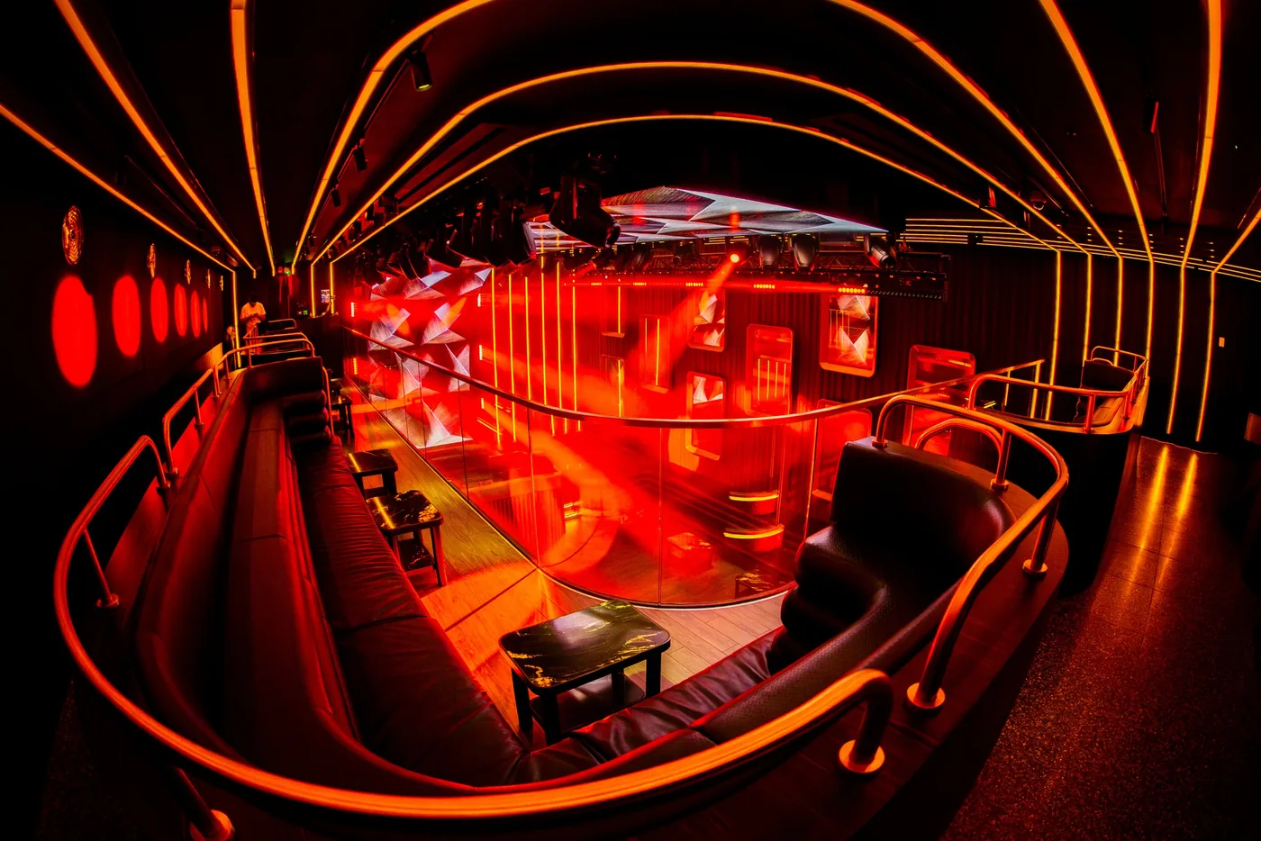 Club 77 - main room curved seating red light