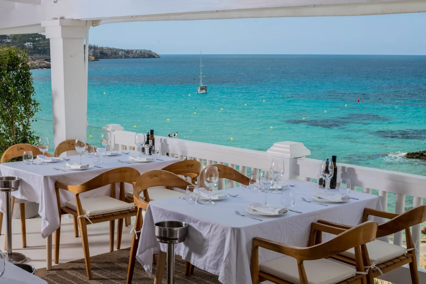 Cotton Beach Club - terrace tables cove
