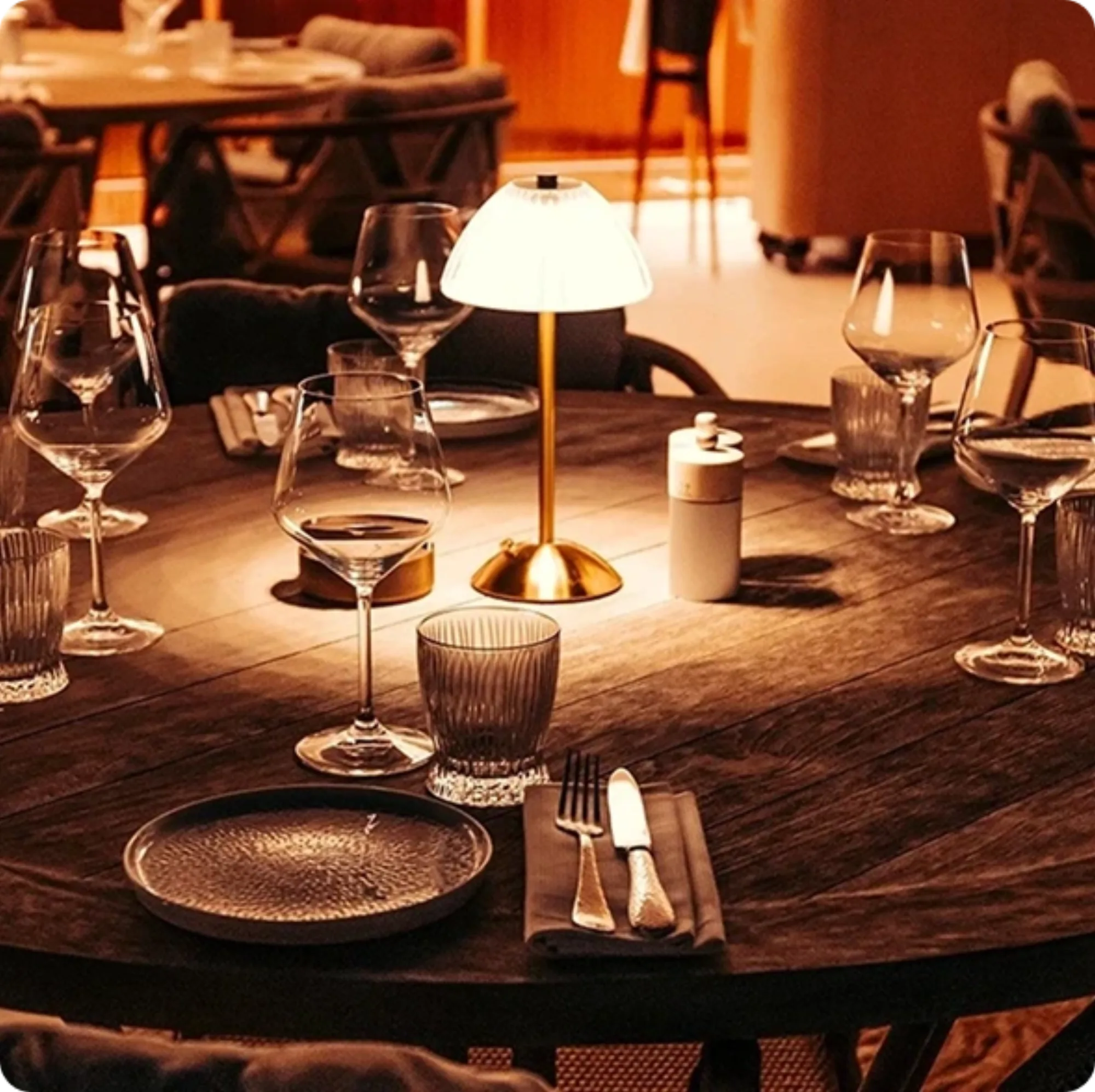 CouCou - g coucou candlelit table dusk