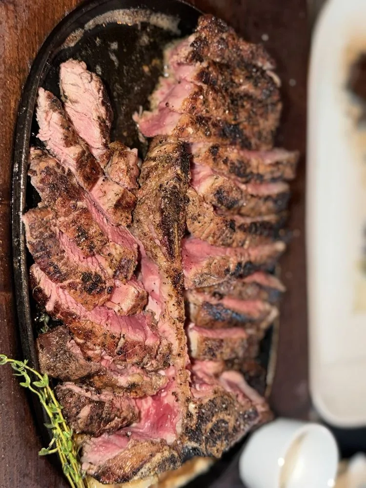 CUT by Wolfgang Puck at Four Seasons Downtown - sliced steak