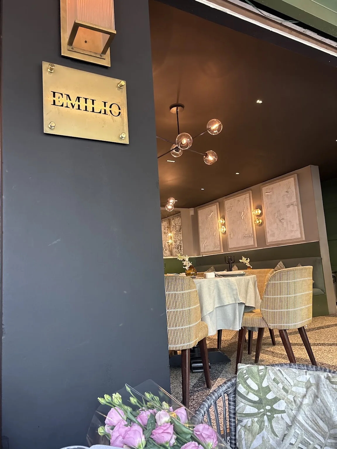Emilio - brass plaque at the dining room e