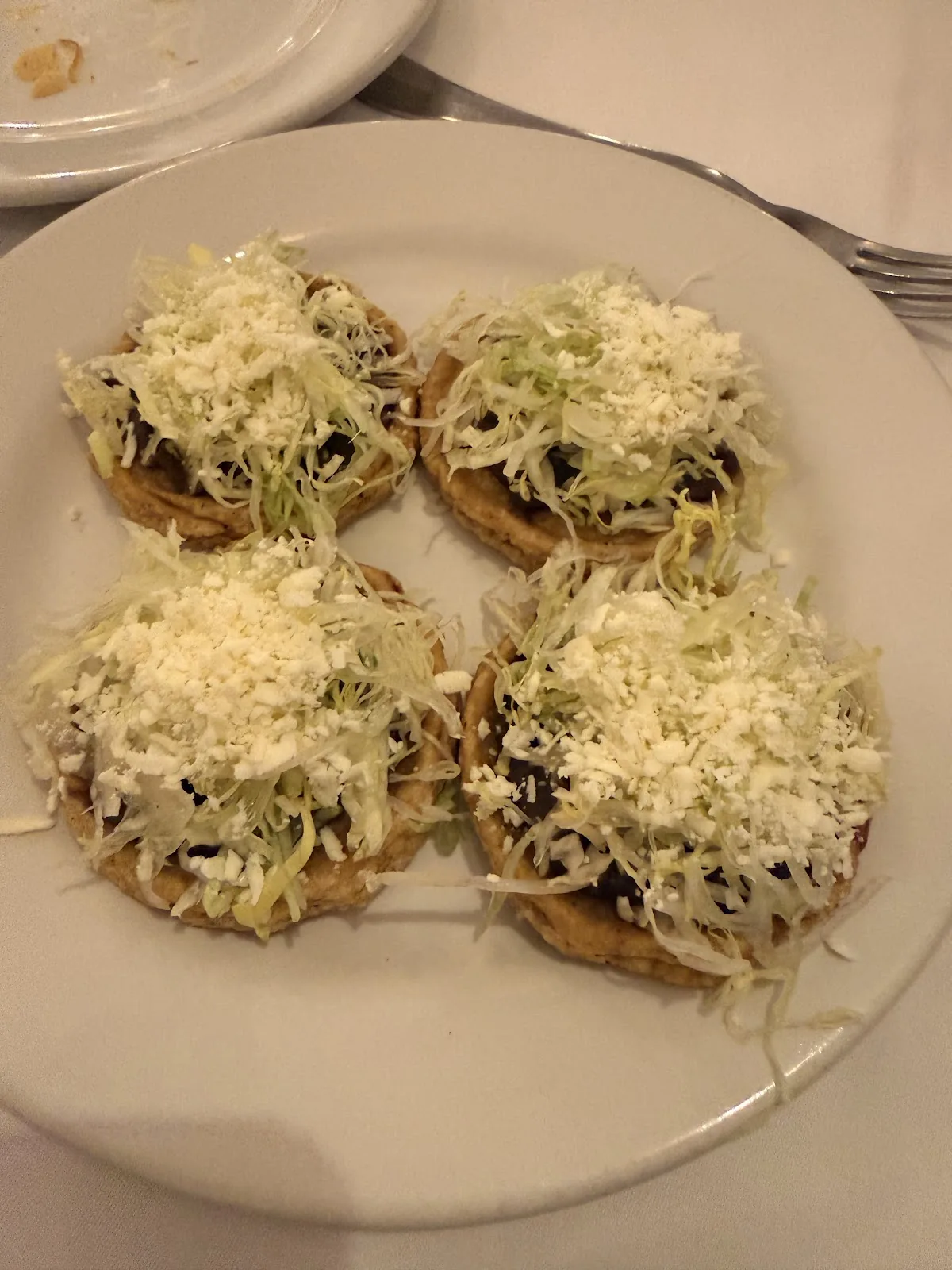 Entremar - tostadas with cabbage and cheese