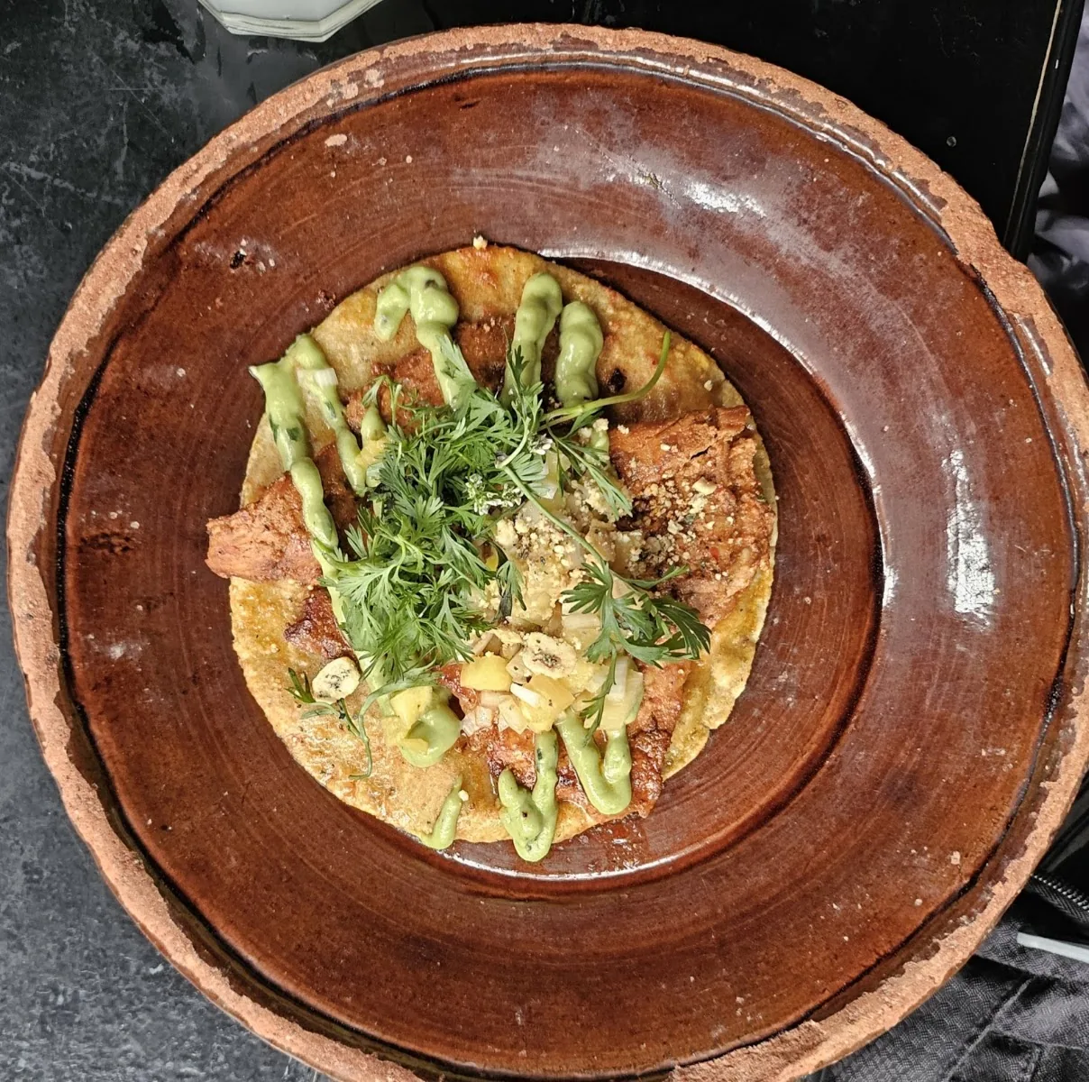 Expendio de Maiz - tostada in clay bowl