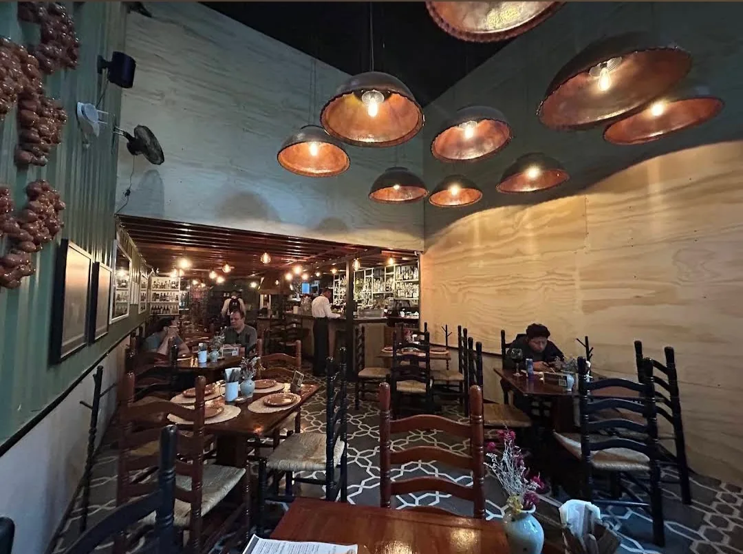 Fonda Fina - interior dining room copper lamps