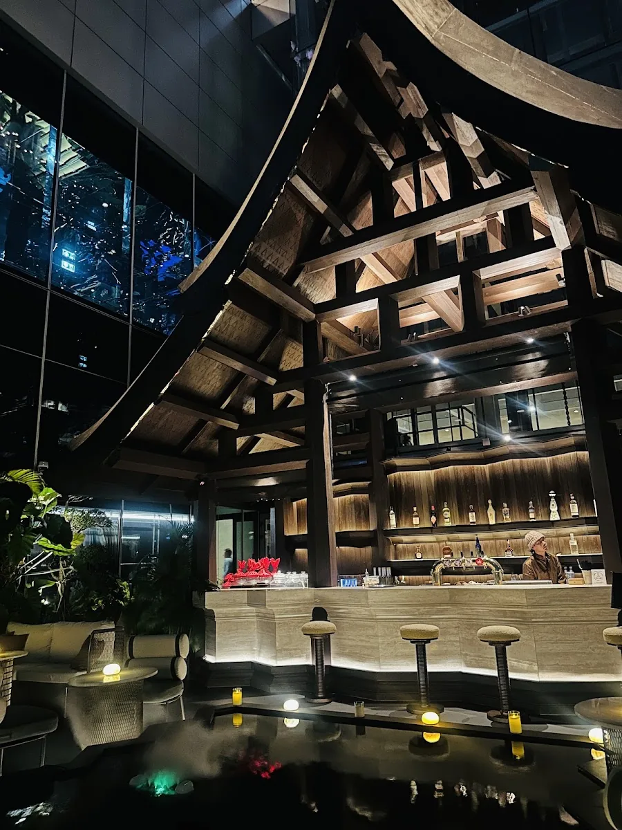 Hanuman Sky Bar / Akara Sky - interior multi level angular atrium bar with skyline view