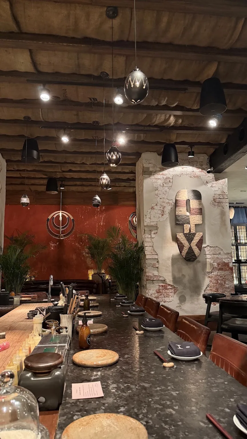 Hotaru Arcos - dining area under pendant lights