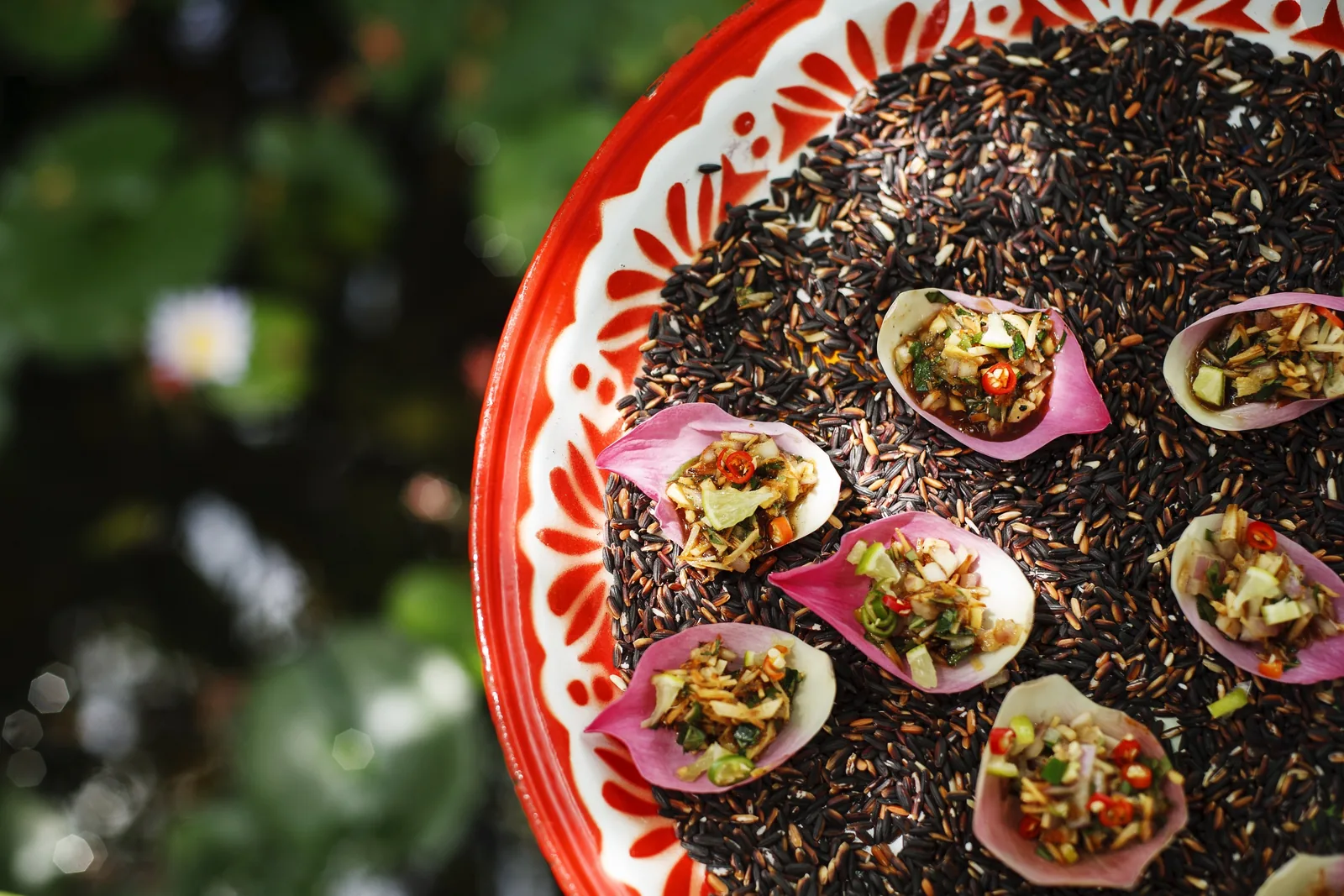 Issaya Siamese Club - amuse bouche canapes arranged on a red enamel platter food