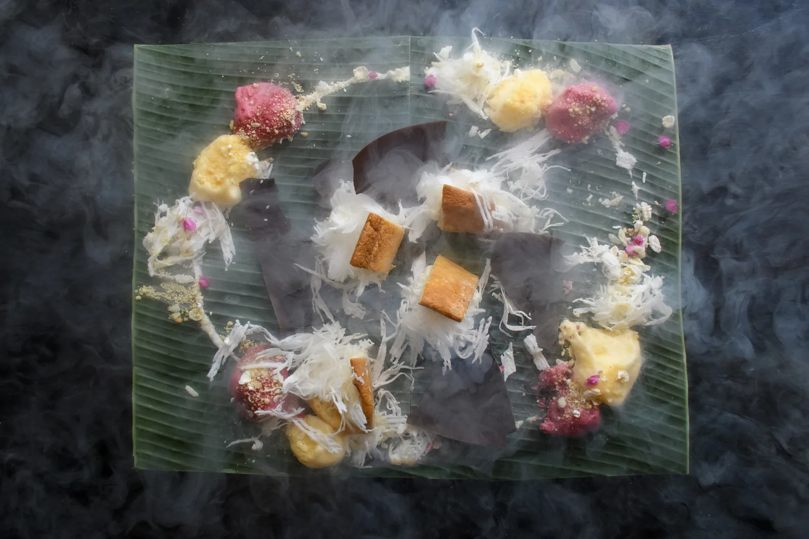 Issaya Siamese Club - dramatic plated course served under aromatic dry ice smoke food