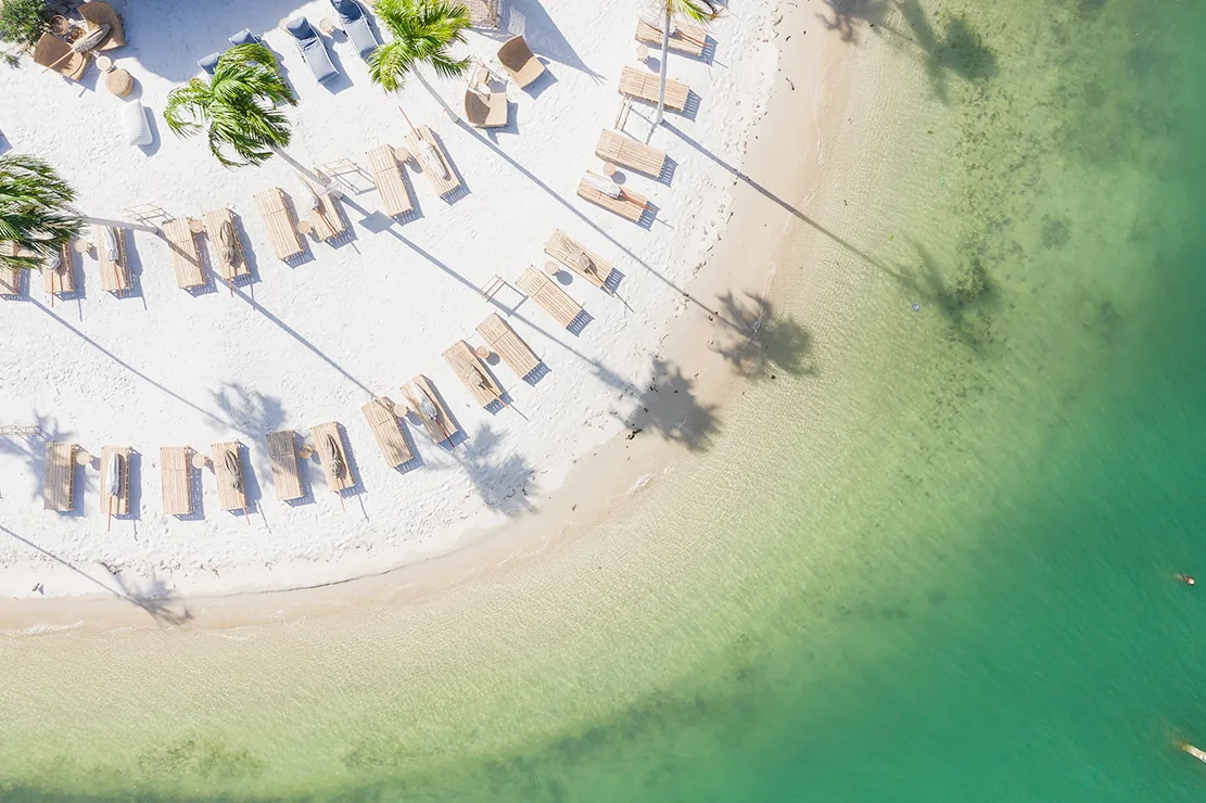 Joia Beach - white sand loungers