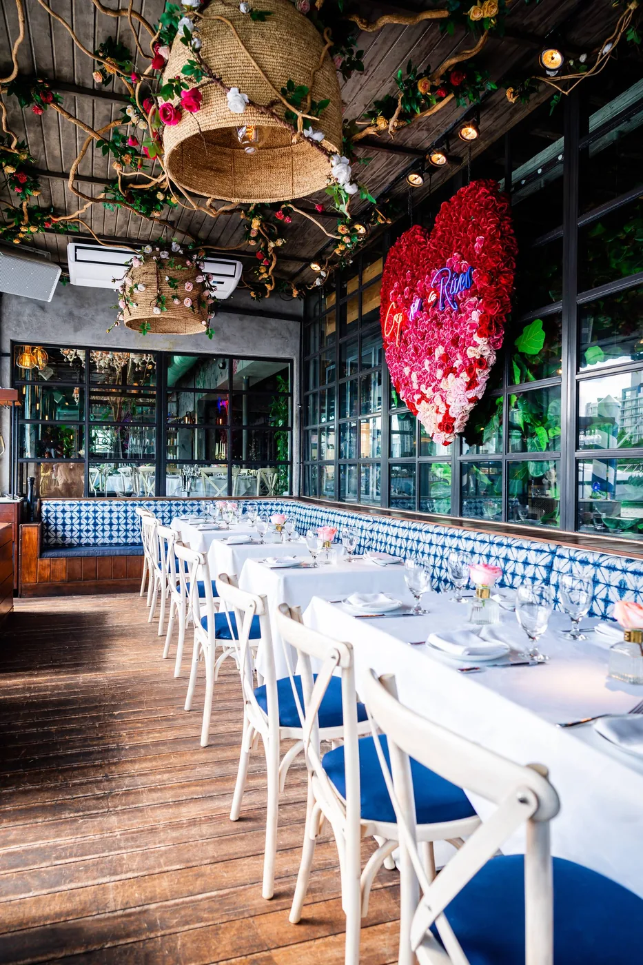 Kiki on the River - red floral dining
