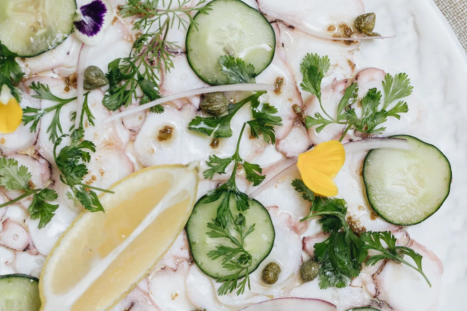 Lampuga Polanco - seafood crudo with cucumber and capers