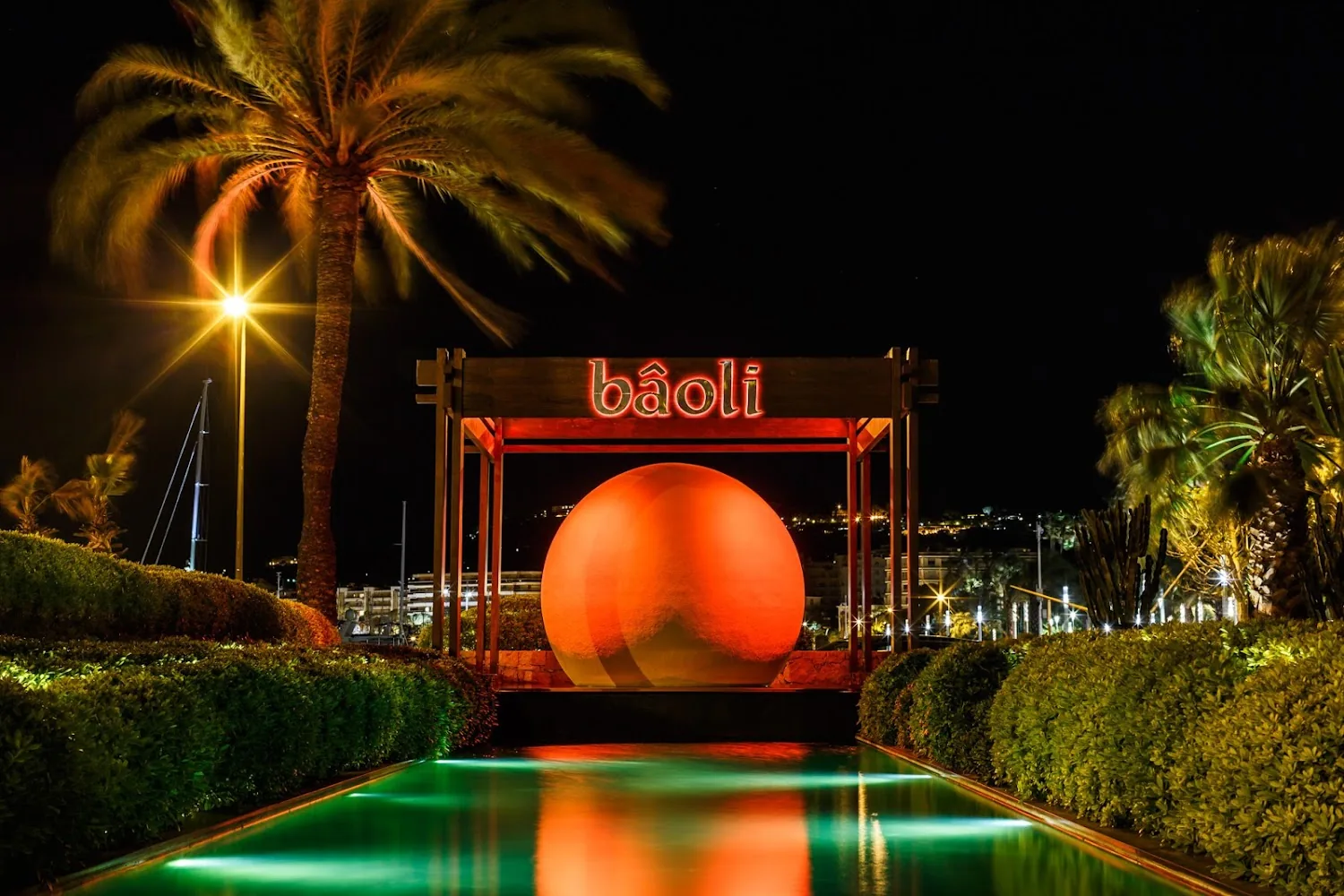 Le Baoli - baoli neon orb reflecting pool night