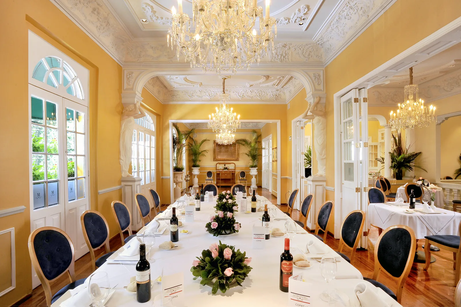 Les Moustaches - long banquet table in main salon
