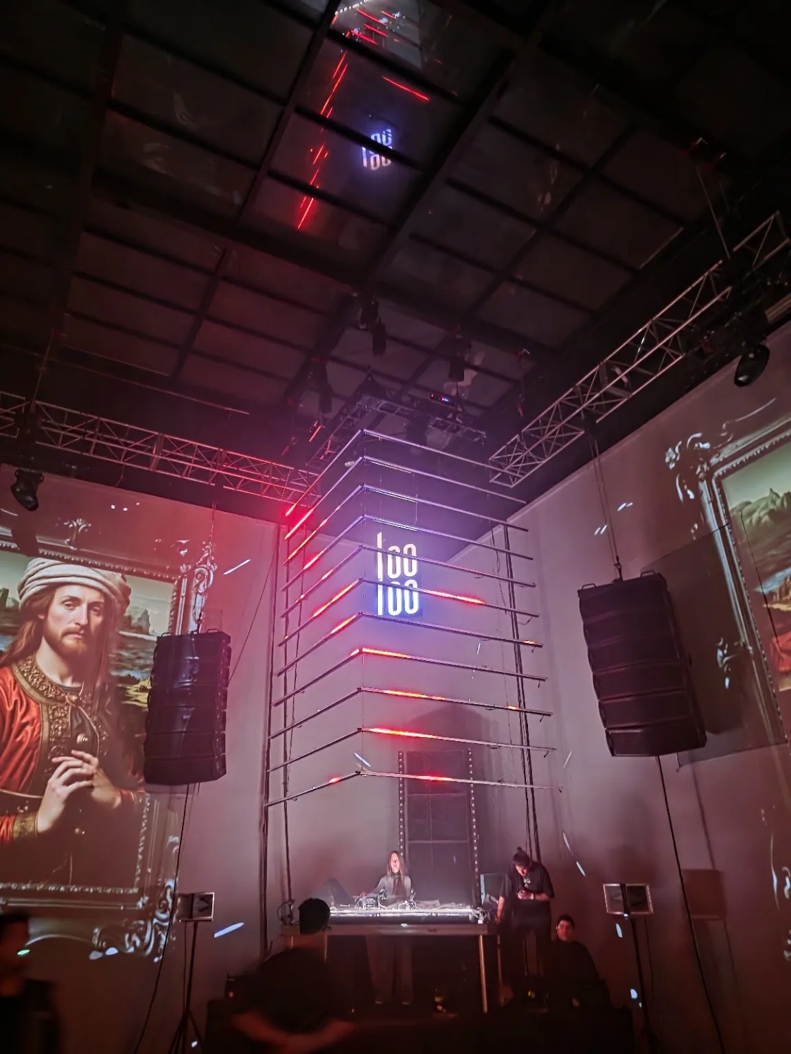 Looloo Studio - dj booth stacked speakers red wash