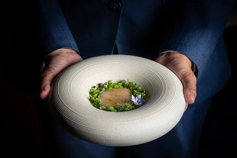 Mia - chef presenting plate