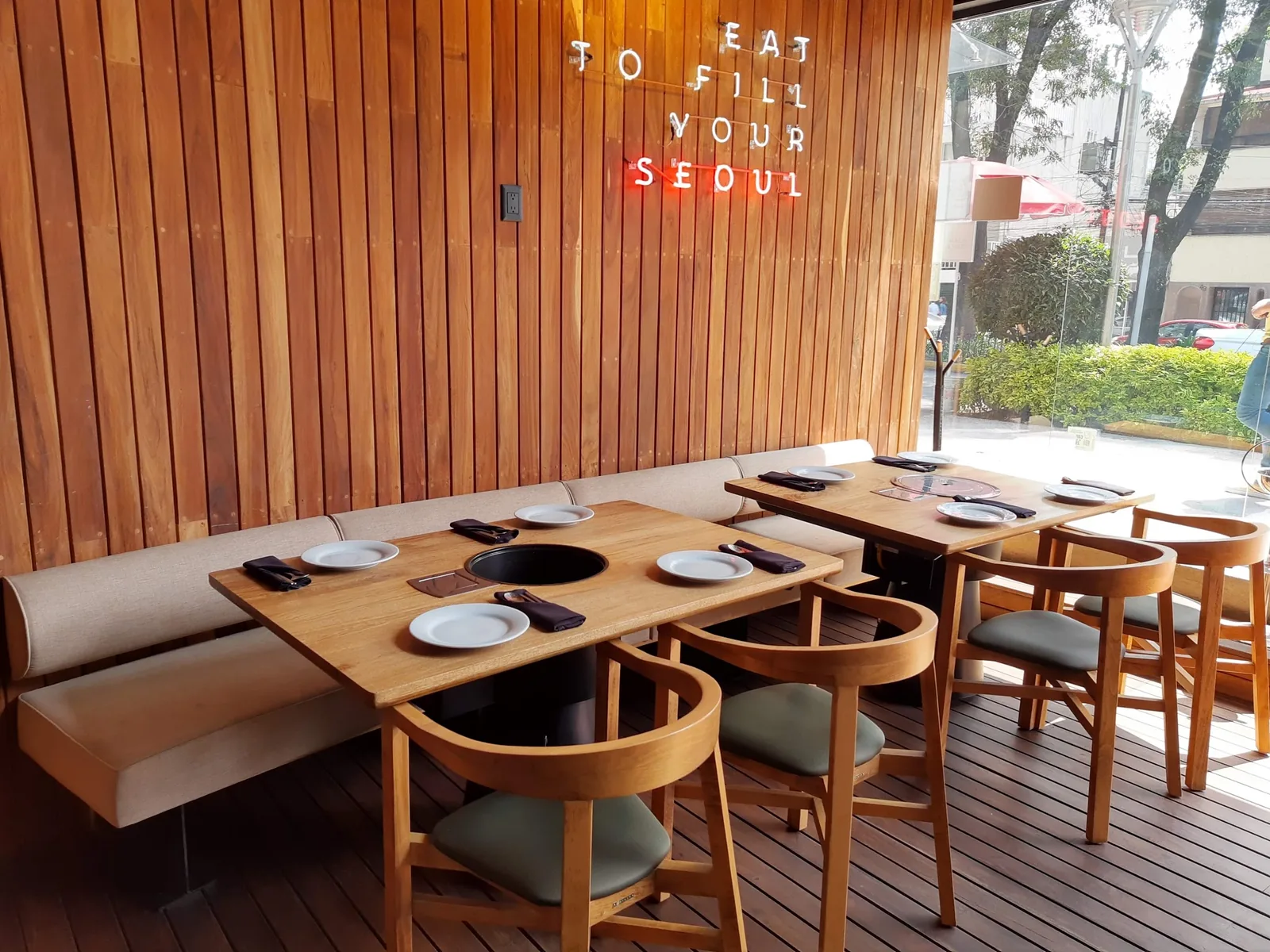 Midam - dining room with slatted wood wall