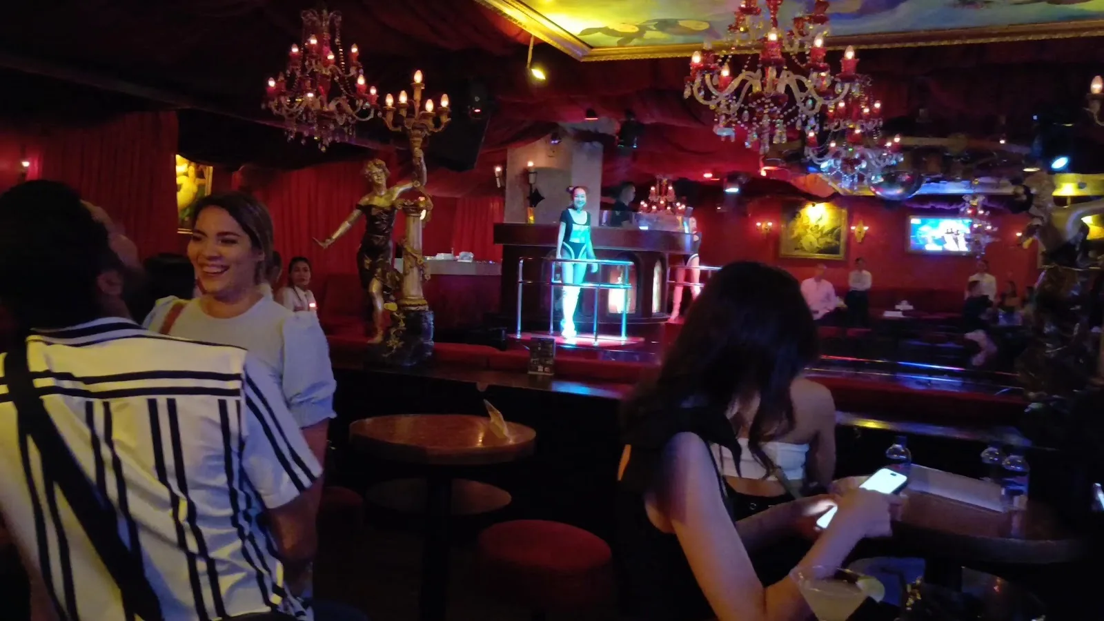 Mixx Discotheque - red lounge chandeliers stage