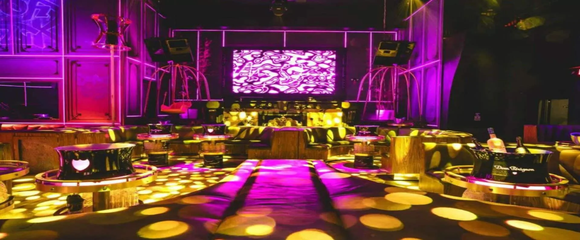 Mr. Jones - empty venue neon swing chairs