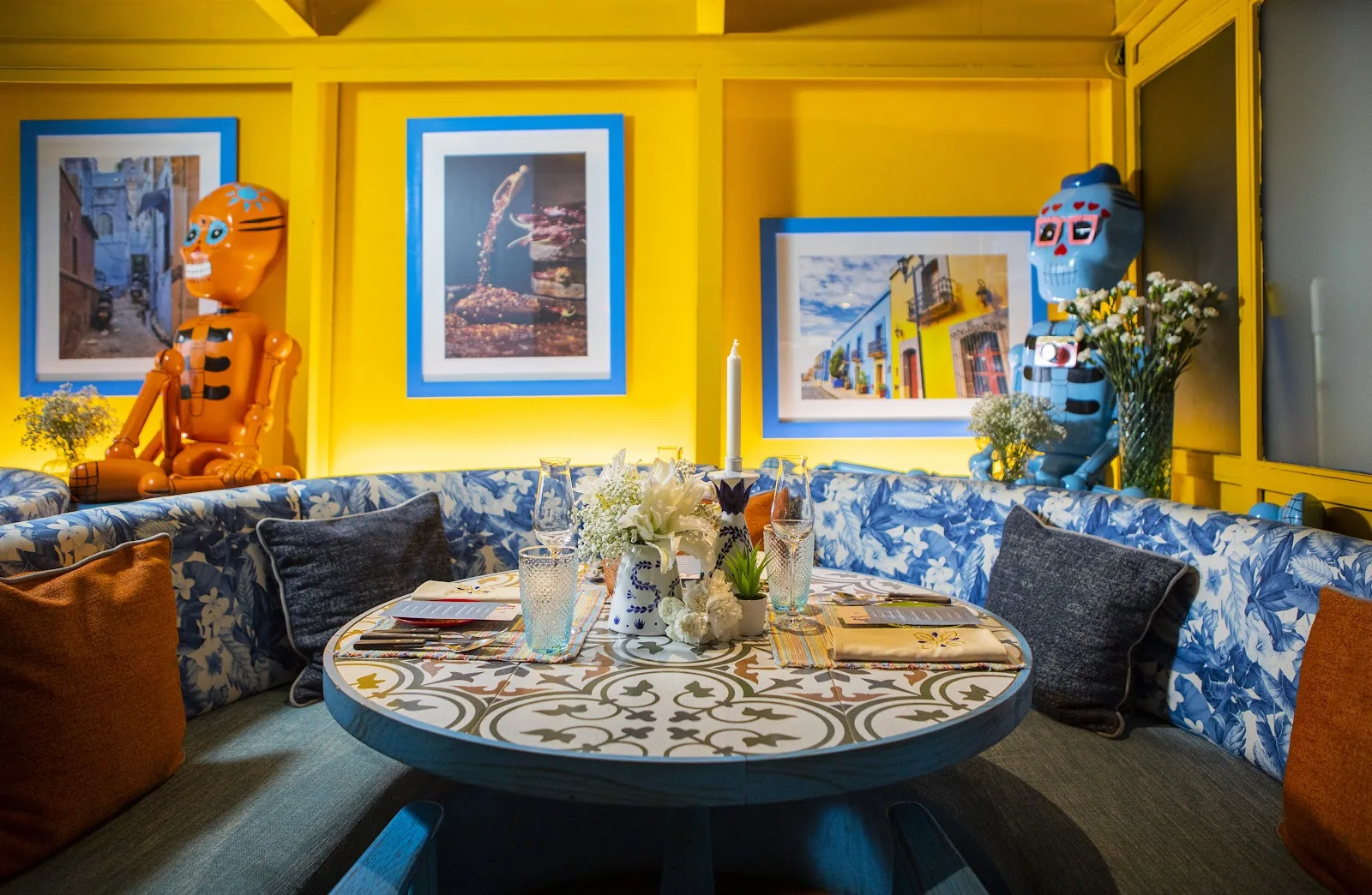 Ms. Maria & Mr. Singh - add yellow art nook mexican decor tiled table banquette