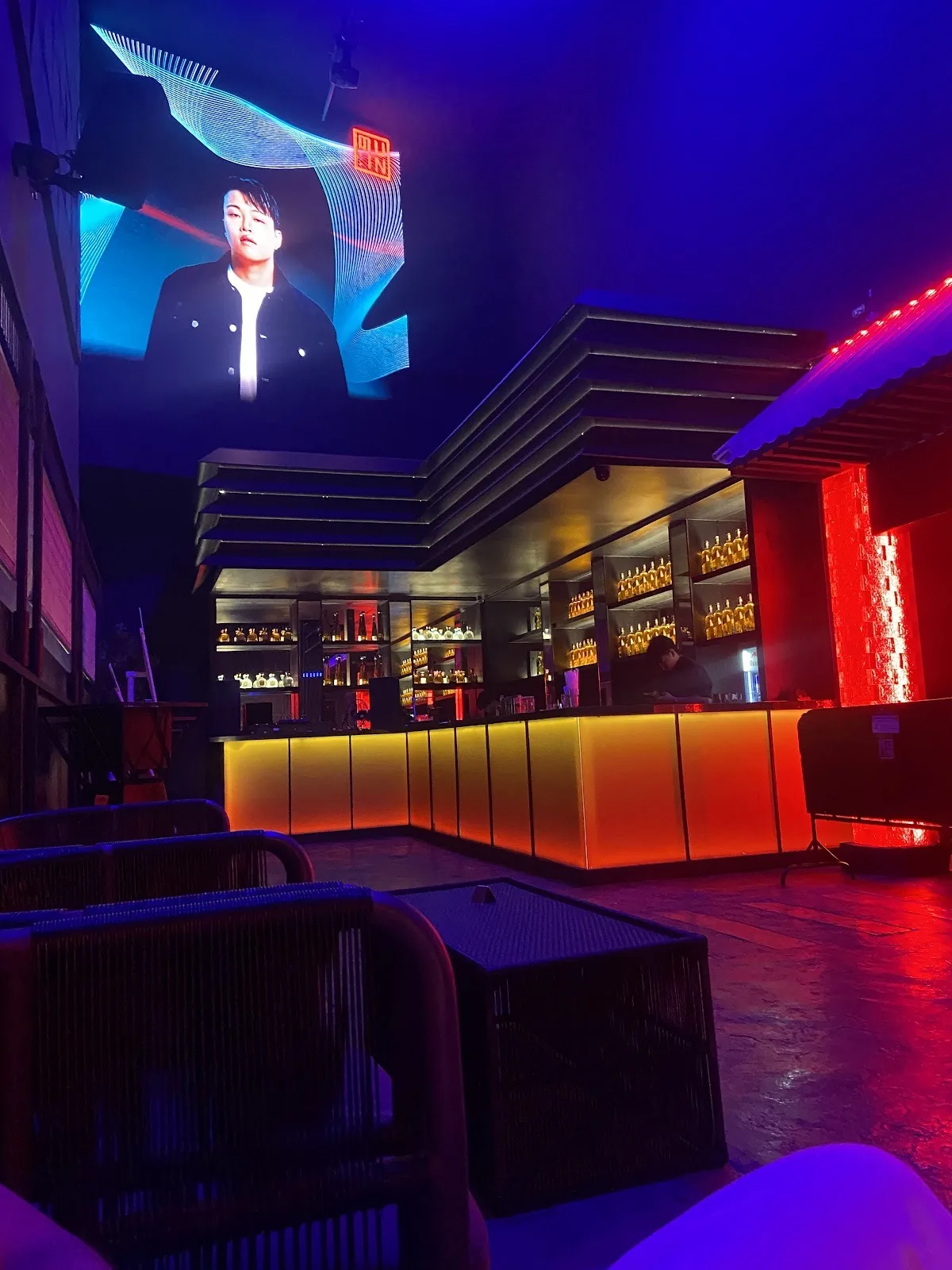 Muin - add backlit orange red bar lounge booths led wall