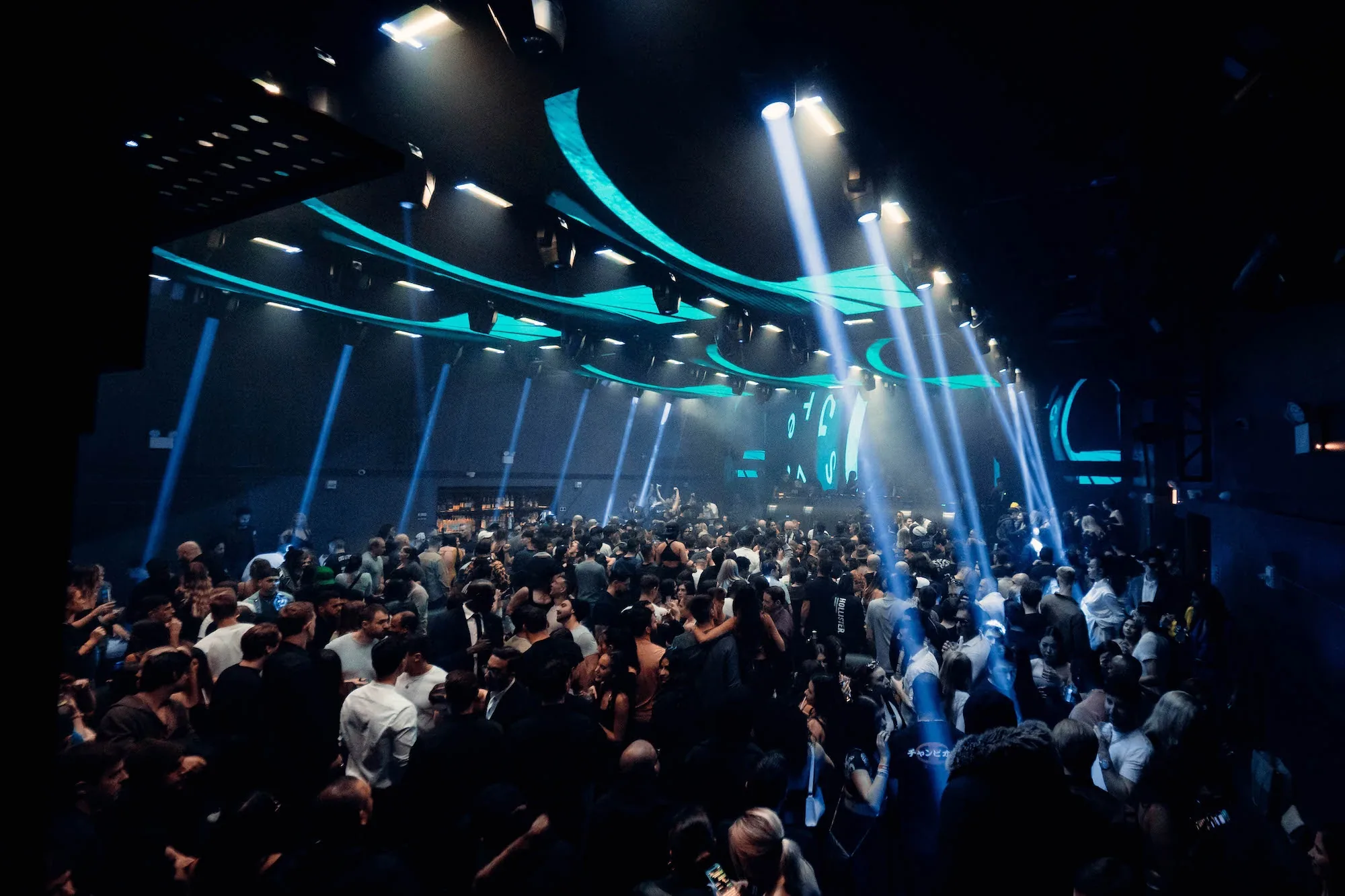 Nebula - packed dance floor laser beams